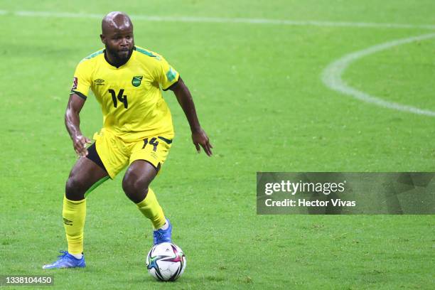 Javon East of Jamaica drives the ball during the match between Mexico and Jamaica as part of the Concacaf 2022 FIFA World Cup Qualifier at Azteca...