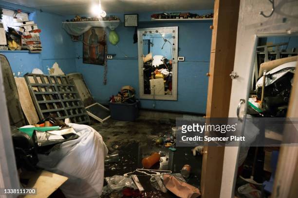 Flooded basement level apartment stands in a Queens neighborhood that saw massive flooding and numerous deaths following a night of heavy wind and...