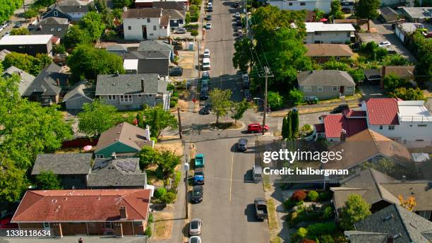 drone shot of residential street in fremont, seattle - seattle aerial stock pictures, royalty-free photos & images