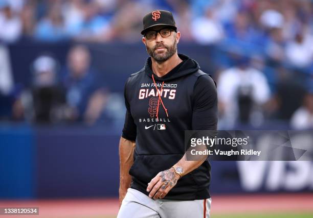 Manager Gabe Kepler of the San Francisco Giants walks off the field after being ejected from the game after J.D. Davis was also ejected from the game...