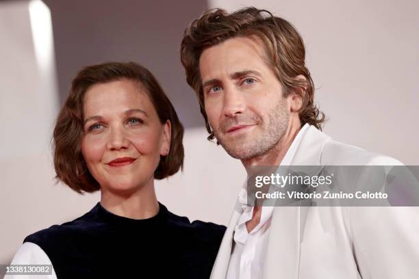Director Maggie Gyllenhaal and Jake Gyllenhaal attend the red carpet of the movie "The Lost Daughter" during the 78th Venice International Film...