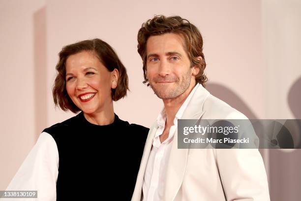 Maggie Gyllenhaal and Jake Gyllenhaal attend the red carpet of the movie "The Lost Daughter" during the 78th Venice International Film Festival on...