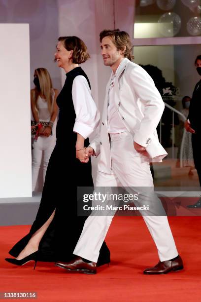Maggie Gyllenhaal and Jake Gyllenhaal attend the red carpet of the movie "The Lost Daughter" during the 78th Venice International Film Festival on...