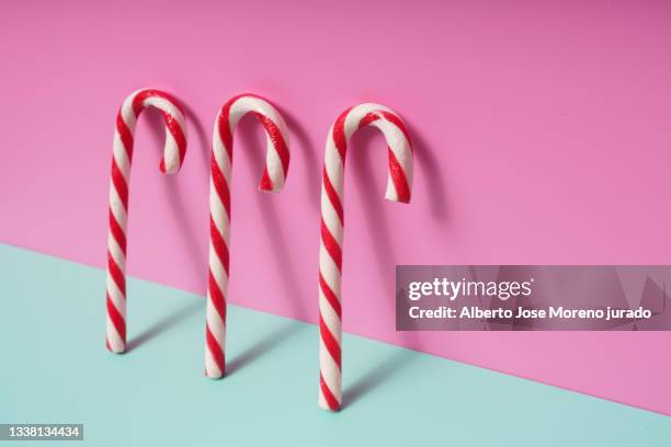 still life candy cane red and white - festivo stock pictures, royalty-free photos & images