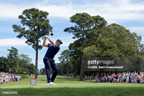 Bryson DeChambeau plays his shot from the fourth tee during the second round of the TOUR Championship at East Lake Golf Club on September 03, 2021 in...