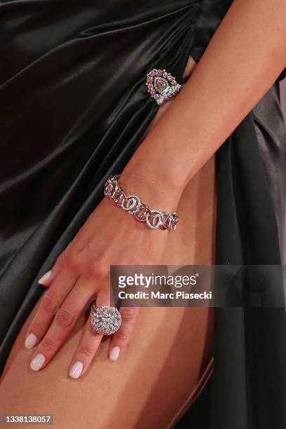 Guest, jewellery detail, walks the red carpet of the movie "The Lost Daughter" during the 78th Venice International Film Festival on September 03,...