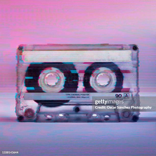 frontal view of a cassette audio tape with glitch vhs effect - it is finished stock-fotos und bilder