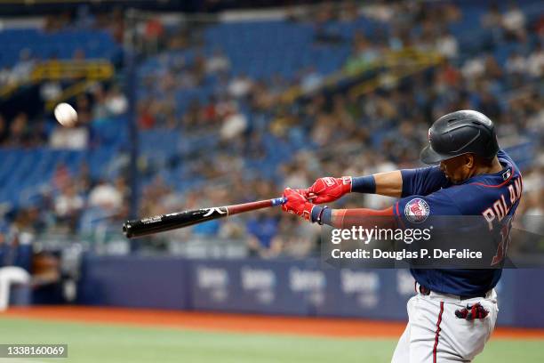 Jorge Polanco of the Minnesota Twins hits a solo home run during the first inning against the Tampa Bay Rays at Tropicana Field on September 03, 2021...