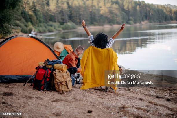 camping on lake - back of chair stock pictures, royalty-free photos & images