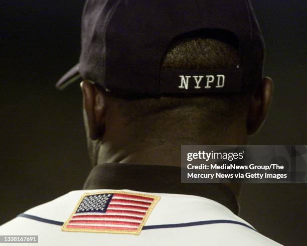 Special hat embroidered with NYPD is seen on a member of the New York Mets during a game against the Atlanta Braves on September 21, 2001 at Shea...