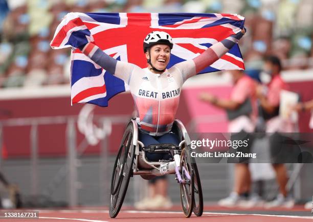 Hannah Cockroft of Team Great Britain celebrates winning the gold medal and breaking the paralympic record after competing in the Women's 800m - T34...