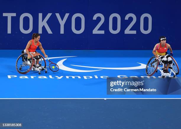 Yui Kamiji and Momoko Ohtani of Team Japan compete against Ziying Wang and Zhenzhen Zhu in Women's Doubles Bronze Medal Match on day 11 of the Tokyo...