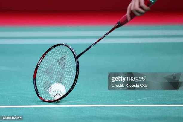 Ayako Suzuki of Team Japan picks up a shuttle with her racket during the Badminton Women's Singles SU5 semi-final against Kaede Kameyama of Team...
