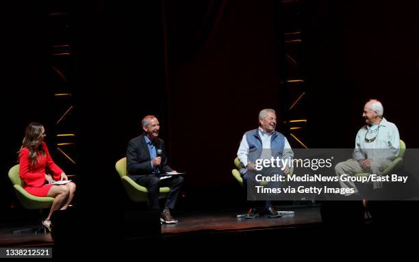 Former San Francisco 49ers coach George Seifert, right, and former 49ers executive Carmen Policy, right center, take part in a conversation with...