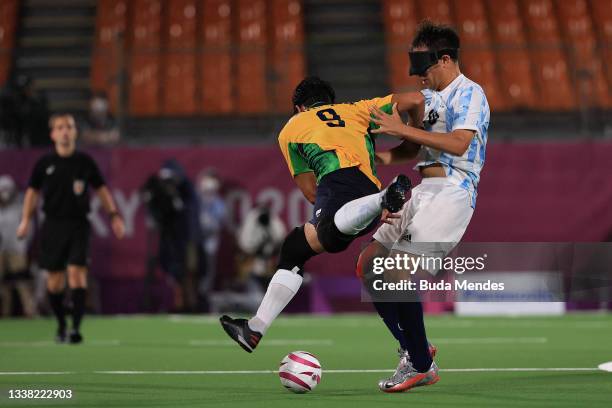 Tiago da Silva of Team Brazil fights for the ball with Braian Pereyra of Team Argentina during football 5-a-side gold Medal Match on day 11 of the...