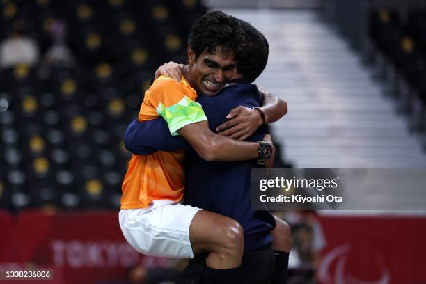 Pramod Bhagat of Team India celebrates winning against Daniel Bethell of Team Great Britain in the Badminton Men's Singles SL3 Gold Medal Match on...