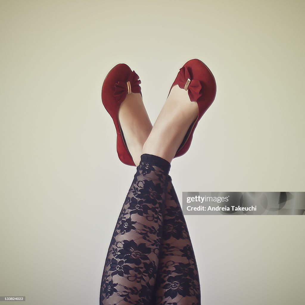 Legs In Air With Red Flats And Lace Tights High-Res Stock Photo - Getty  Images