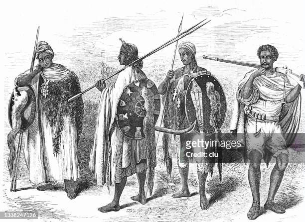 four ethiopian warriors with lances and shields, full length, outdoor - ethiopia stock illustrations
