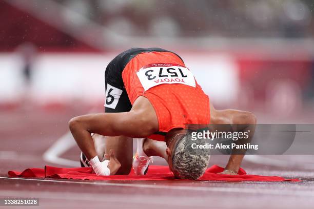 Ayoub Sadni of Team Morocco reacts after winning the gold medal and breaking the world record after competing in the Men's 400m - T47 Final on day 11...
