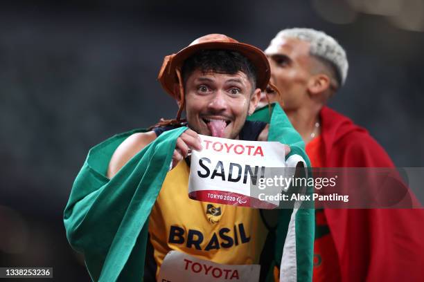 Petrucio Ferreira dos Santos of Team Brazil celebrates winning the bronze medal after competing in the Men's 400m - T47 Final on day 11 of the Tokyo...