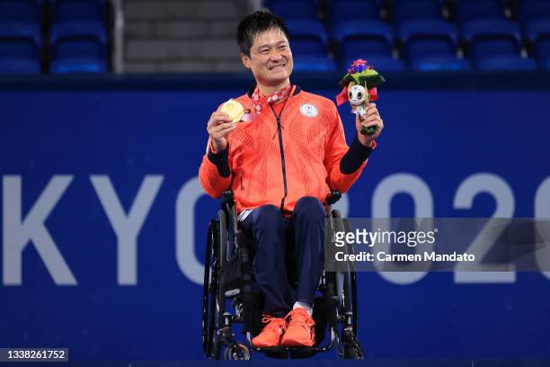 Gold medalist Shingo Kunieda of Team Japan poses in the podium during victory ceremony for Men's singles Wheelchair Tennis on day 11 of the Tokyo...