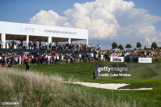 Tommy Fleetwood of England chips onto the 18th green during Day Three of The Italian Open at Marco Simone Golf Club on September 04, 2021 in Rome,...