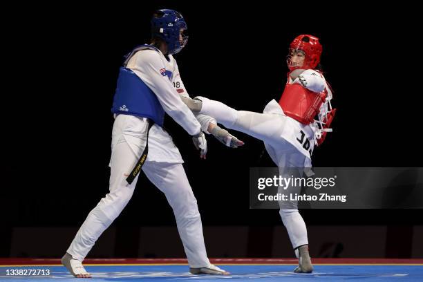 Shoko Ota of Team Japan competes with Janine Watson of Team Australia during the Women K44 +58kg Repechage Senifinals match on day 11 of the Tokyo...