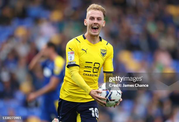 Mark Sykes of Oxford United celebrates after scoring their team's first goal during the Sky Bet League One match between AFC Wimbledon and Oxford...