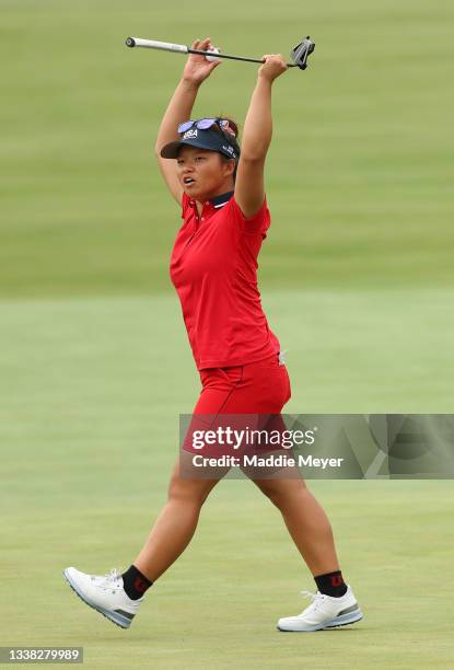 Megan Khang of Team USA reacts after sinking her putt 15th green on the during the first round of the Solheim Cup at the Inverness Club on September...