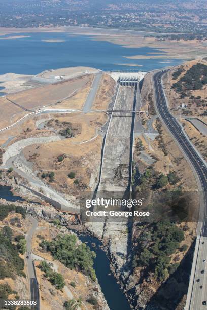 Folsom Lake, one of California's larger water reservoirs fed by the three forks of the American River, is at 24% capacity and is at historically low...