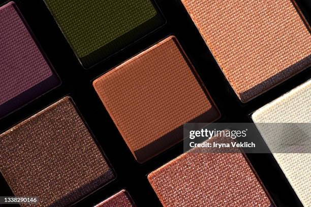 makeup eyeshadows in trendy natural colours background. - eyeshadow stock pictures, royalty-free photos & images