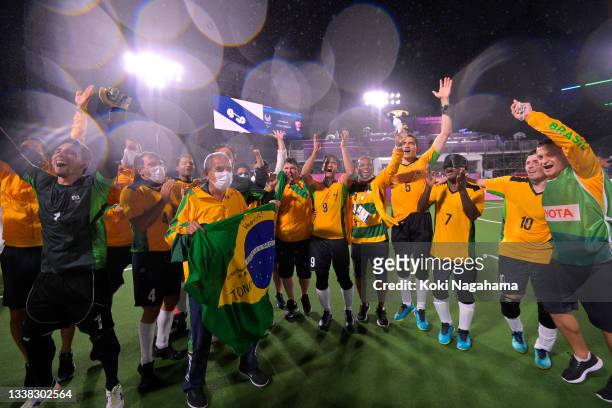 Players and staff of Team Brazil celebrate after winning football 5-a-side gold Medal Match against Argentina on day 11 of the Tokyo 2020 Paralympic...