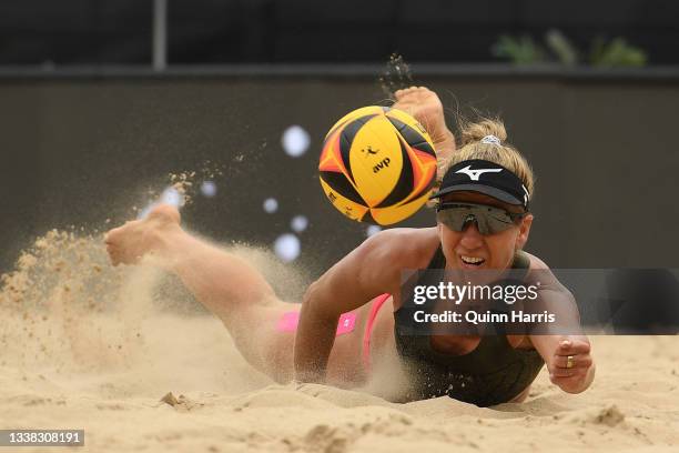 April Ross digs the ball during the match against Sara Hughes and Brandie Wilkerson during the AVP Gold Series Chicago Open at the Oak Street Beach...