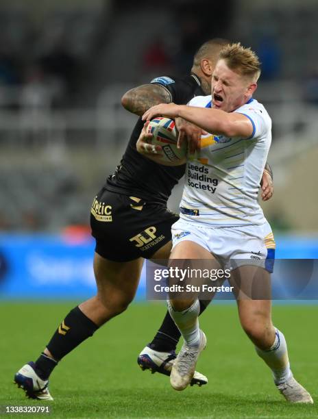 Rhinos player Brad Dwyer reacts after being tackled by Manu Ma'u during the Betfred Super League match between Leeds Rhinos and Hull FC at St James'...