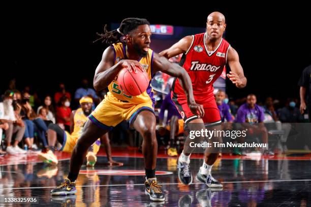 Kevin Murphy of the 3 Headed Monsters dribbles the ball while being guarded by Jarrett Jack of the Trilogy during the BIG3 - Championship at Atlantis...