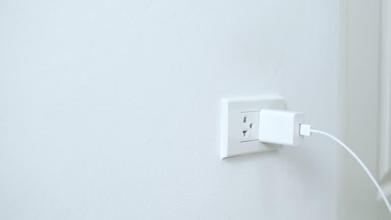 Plu Plugged In 380 Electrical Cord Plugged Into Wall Outlet Close Up Stock Videos ...