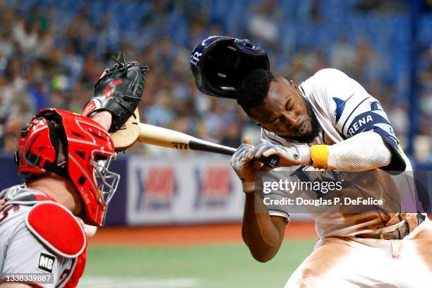 Randy Arozarena of the Tampa Bay Rays is hit by a pitch during the fifth inning against the Minnesota Twins at Tropicana Field on September 04, 2021...