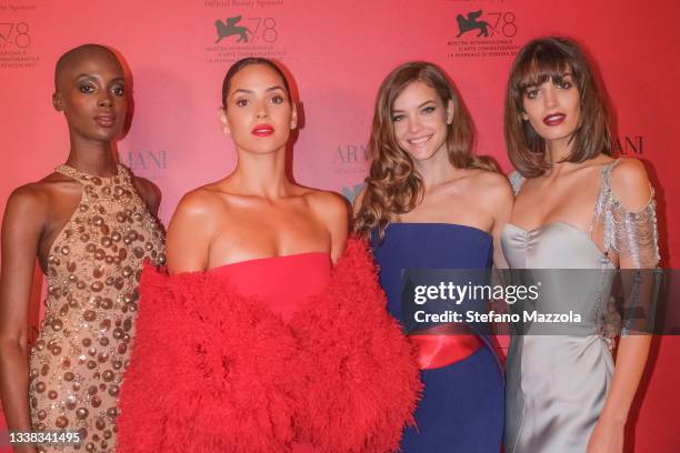 Madisin Rian, Adria Arjona, Barbara Palvin and Greta Ferro attend the Armani dinner photocall during the 78th Venice International Film Festival on...