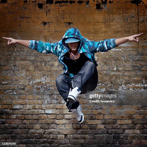 hip hop dancer jumping - break dance city stock pictures, royalty-free photos & images