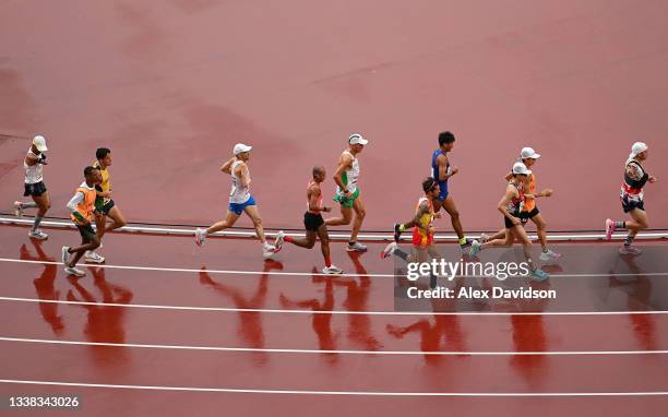 Runners head around the stadium at the start of the Men's T12 and T46 Marathon + Women's T12 on day 12 of the Tokyo 2020 Paralympic Games at Olympic...