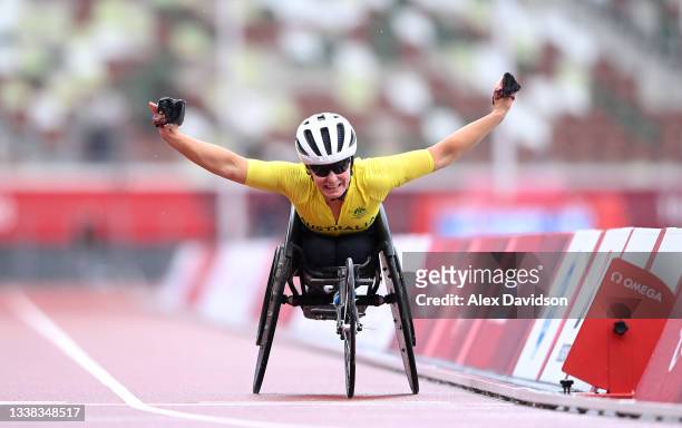 Christie Dawes of Team Australia crosses the finish line during the women's Marathon - T54 on day 12 of the Tokyo 2020 Paralympic Games at Olympic...