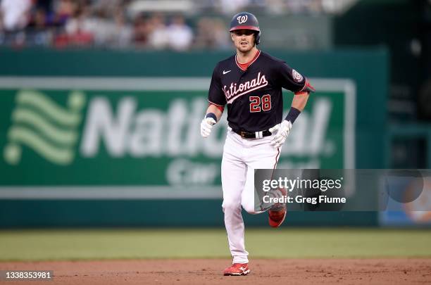 Lane Thomas of the Washington Nationals rounds the bases after hitting a home run in the first inning against the New York Mets during game two of a...