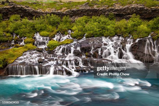 iceland hraunfossar waterfall - hraunfossar stock pictures, royalty-free photos & images