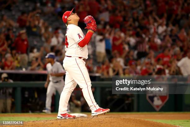 Jose Suarez of the Los Angeles Angels reacts after the 4-1 win against the Texas Rangers after the game at Angel Stadium of Anaheim on September 04,...