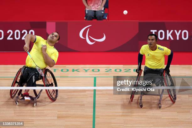 Jakarin Homhual and Dumnern Junthong of Team Thailand compete in the Badminton Men's Doubles WH Bronze Medal match against Daiki Kajiwara and Hiroshi...