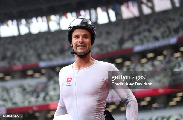 Marcel Hug of Team Switzerland reacts after victory in the Mens Marathon - T52 on day 12 of the Tokyo 2020 Paralympic Games at Olympic Stadium on...