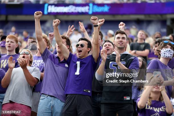 Fans cheer during the game between the Washington Huskies and the Montana Grizzlies at Husky Stadium on September 04, 2021 in Seattle, Washington.