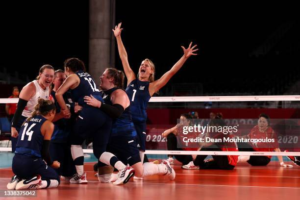 Team United States celebrate victory after winning the Women's Sitting Volleyball gold match between China and The United States of America on day 12...