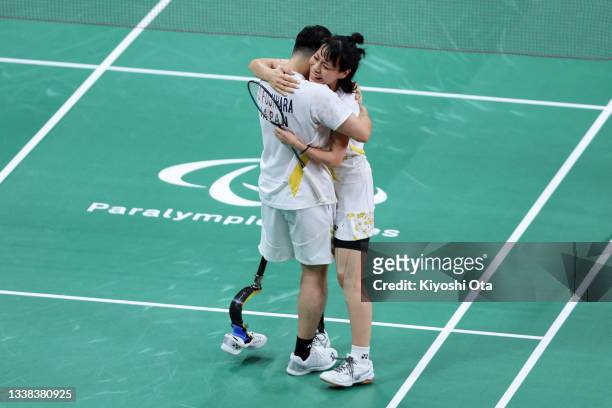 Akiko Sugino and Daisuke Fujihara of Team Japan celebrate winning the Badminton Mixed Doubles SL3-SU5 Bronze Medal Medal Match against Palak Kohlo...
