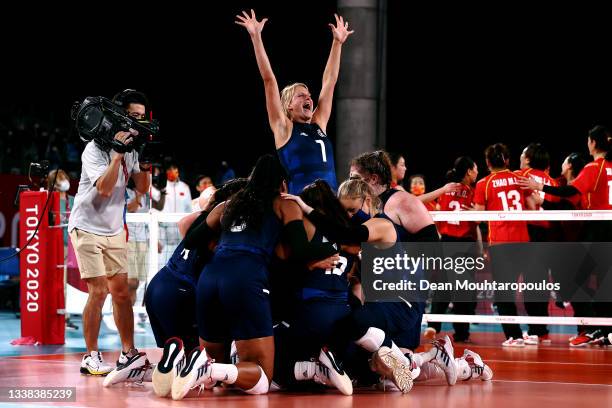 Team United States celebrate victory after winning the Women's Sitting Volleyball gold match between China and The United States of America on day 12...